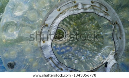 Inside look of the zorb ball with the bubbles-like inflatable wall of the zorb