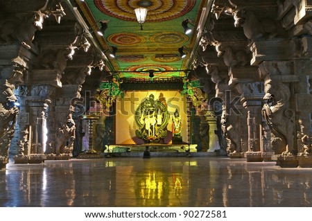 Inside of Meenakshi hindu temple in Madurai, Tamil Nadu, South India. Religious hall of thousands of columns