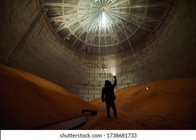 Inside of metal elevator (grain silo) in agriculture zone. Grain Warehouse or depository is an important part of harvesting. Сorn, wheat and other crops are stored in it