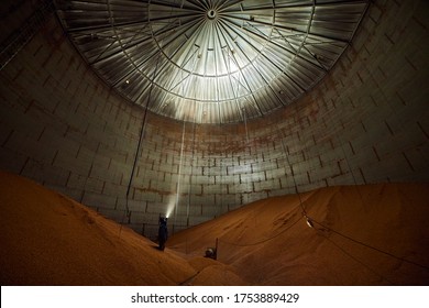 Inside Of Metal Elevator (grain Silo) In Agriculture Zone. Grain Warehouse Or Depository Is An Important Part Of Harvesting. Сorn, Wheat And Other Crops Are Stored In It