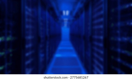 Inside a modern data center, rows of servers are illuminated by blue lights, showcasing advanced technology and data storage capabilities. This image represents the digital age.