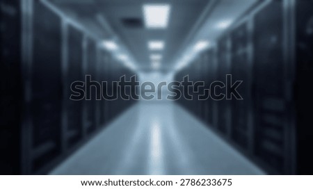 Inside a modern data center, rows of server racks and equipment are visible. The image shows the infrastructure of a large data storage facility.
