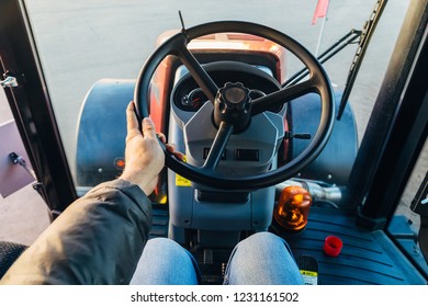 Inside Modern Tractor. Steering Wheel. View From Work Place.