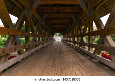 Inside A Naperville Riverwalk Covered Bridge Over The DuPage River