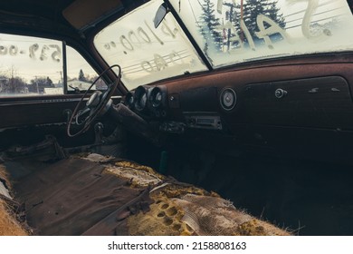 An Inside Of An Old Abandoned Car