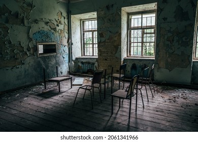 Inside old Asylum for the insane. Dark creepy abandoned mental hospital.