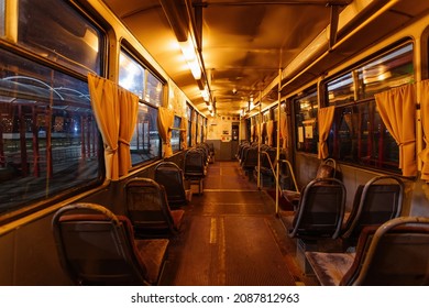 Inside of old empty Russian tram at night.