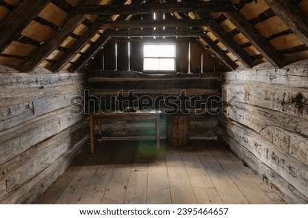 Inside of an old fashioned American log cabin in the Ulster American Folk Park, Northern Ireland