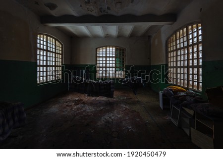 Inside old Orlovka Asylum for the insane in Voronezh Region. Dark creepy abandoned mental hospital.
