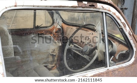 Inside an old and rusted car,vintage illustration.