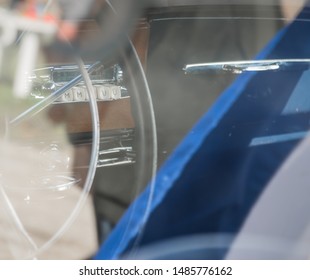 Inside Oldtimer Vehicle, Shot Thru Window Reflection.