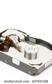 Inside opened pc hard disc isolated over white background.