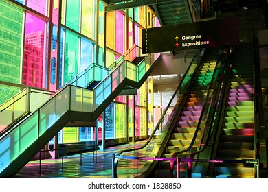 Inside The Palais Des CongrÃ¨s In MontrÃ©al. The Colored Glass Windows Filter The Sunlight To Create This Nice Effect.