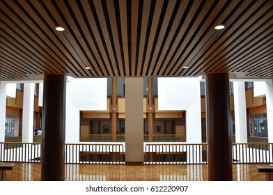 Inside The Parliament House, Canberra Australia. Timber Floor And Ceiling, Wooden Pillars. 