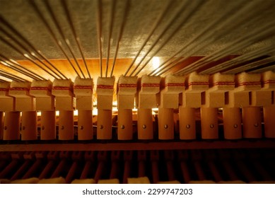 Inside the piano. Strings inside the upright piano.