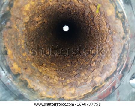 Inside the pipe with rust