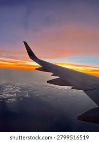 inside the plane while looking at the extraordinary view outside the plane