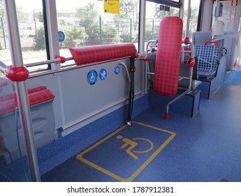 Inside A Public Bus, Reserved Seat Label On-board Bus For Disabled People. Barcelona Public Transport, Icon For Wheelchair