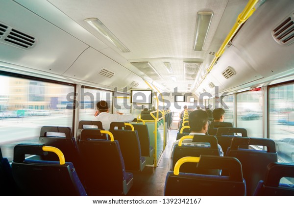 Inside of a public utility bus. -Daily route of a\
public bus.
