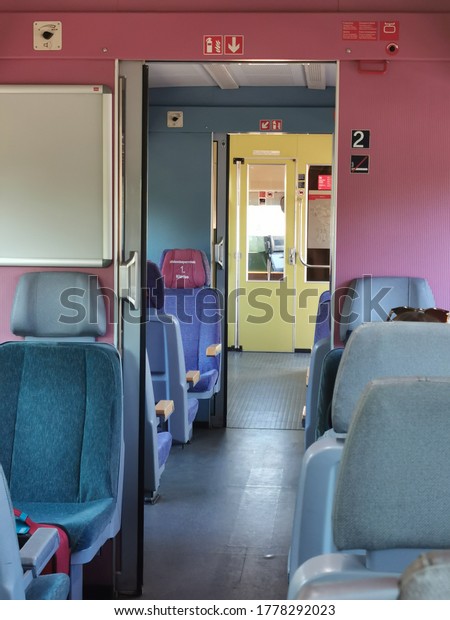 Inside\
a railway cabin, colorful interior, candy colors\
