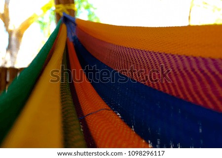 From inside the rainbow hammock, colorful tissue