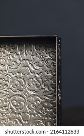 Inside Right Corner Of A Vintage Metal Box With Beautiful Engravings