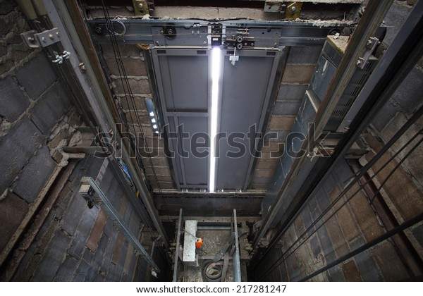 inside of roping Elevator, Lift box built  in high\
building show strong structure use for engineering construction and\
industrial object 