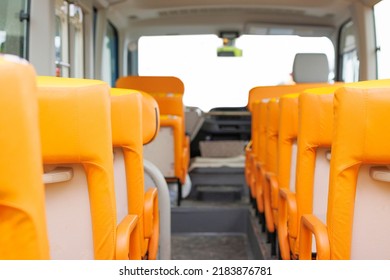 Inside A School Bus With Orange Seats