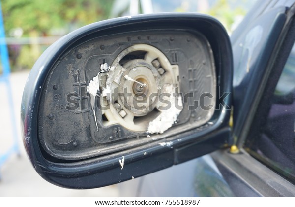 Inside of side-view mirror because accident make\
mirrror breaking, need temporary small round mirror to attach there\
before drive to garage