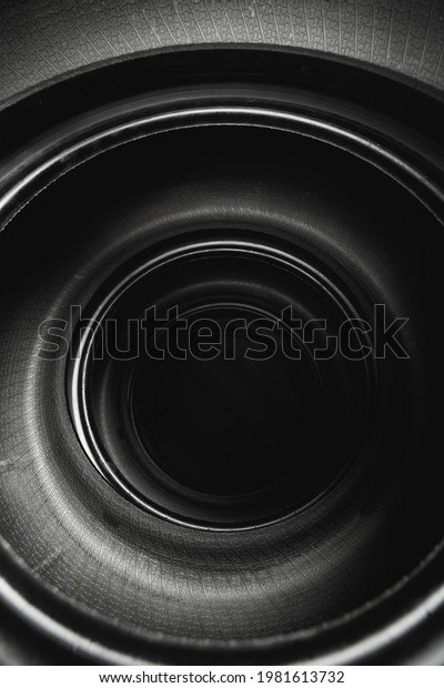 inside of
stacked car tires, abstract black
background