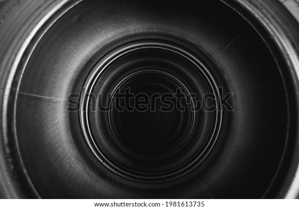 inside of\
stacked car tires, abstract black\
background