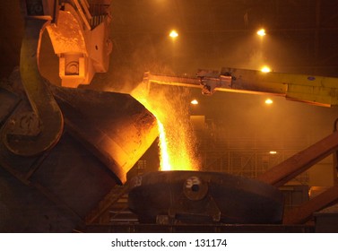 Inside Of A Steel Mill, Hot Metal Pouring.