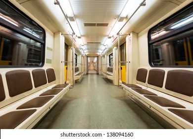 Inside Subway Car In Moscow Metro, Russia. Interior Perspective View Of Russian Subway Train Carriage. Panorama Of Empty Urban Underground Transport. 