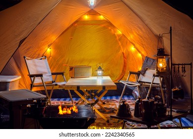 Inside of tent in camping, too many assessories and decoration for cooking, coffee and working between travel in camping trip