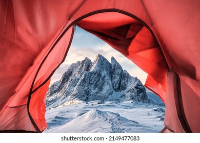 Inside A Tent Pitching On Snow Covered Hill With Majestic Mountain On Winter At Senja Island, Norway