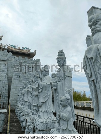 Inside of the Thousand Statues Temple in Bintan, Riau Islands, Indonesia. A religious hall with thousands of statues.