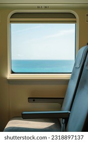 Inside of train and view of seascape from window in Taitung, Taiwan