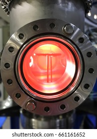 Inside Vacuum Chamber Doing The Sputtering To Fabricate Thin Film Technology.