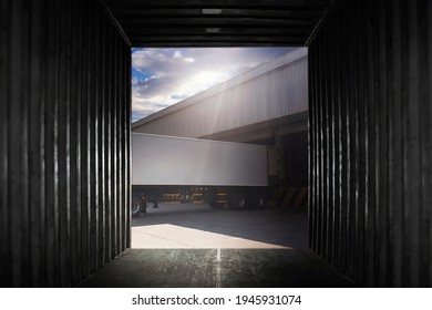 Inside View Of Cargo Container Truck Parked Loading At Dock Warehouse. Cargo Freight Truck. Shipping Warehousing Logistics And Transpoartation.