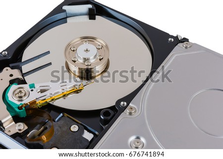 Inside view of hard disk isolated on white background