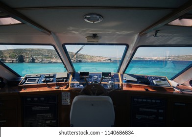 Inside view on the boat cockpit on the Blue Lagoon, Comino, Malta