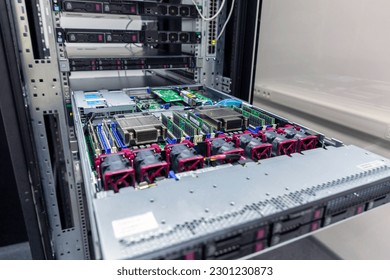 Inside view of opened multiprocessor server in rack frame of IT datacenter. - Powered by Shutterstock - Get 15% off with code: PIKWIZARD15