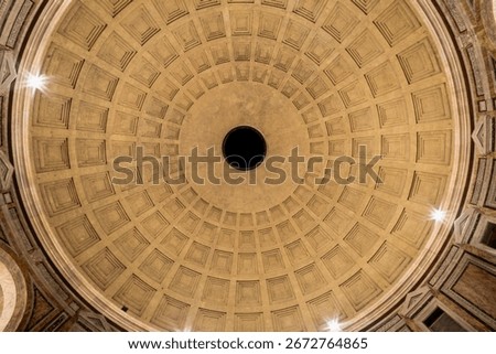 Inside view of the stone dome of the Pantheon in Rome.
