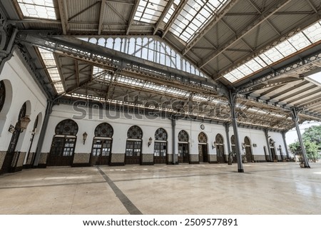 Inside view of a train station in Oran, Algeria. Beautiful vintage train station, platform view, with trains departing to Algiers and other cities.