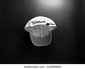 Inside View Of White Baseball Cap In The Center Position With Vintage Colour Background.