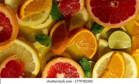 Inside Of The Virgin Punch Bowl Made Of Orange Juice With Fresh Citrus Slices And Mint.