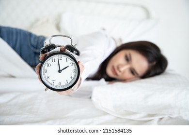 Insomnia In Beautiful Women. An Asian Woman Tries To Sleep But She Cannot Sleep Because She Has Anxiety And Stress From Hard Work. Psychiatric Care And Medication From A Doctor