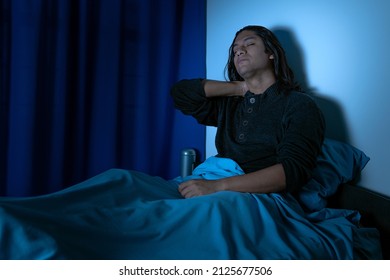 Insomnia, Depressed Man Sitting Up In Bed At Night, He Can't Sleep From Insomnia