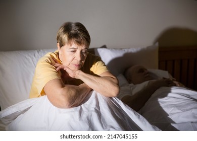 Insomnia. Healthy Sleep. Senior Healthy Lifestyle. Elderly Woman Suffers From Insomnia At Night Lying In Bed