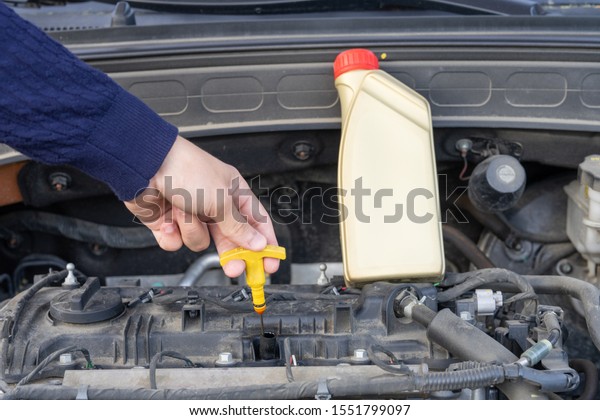 Inspection\
of the engine oil or checking motor oil\
level